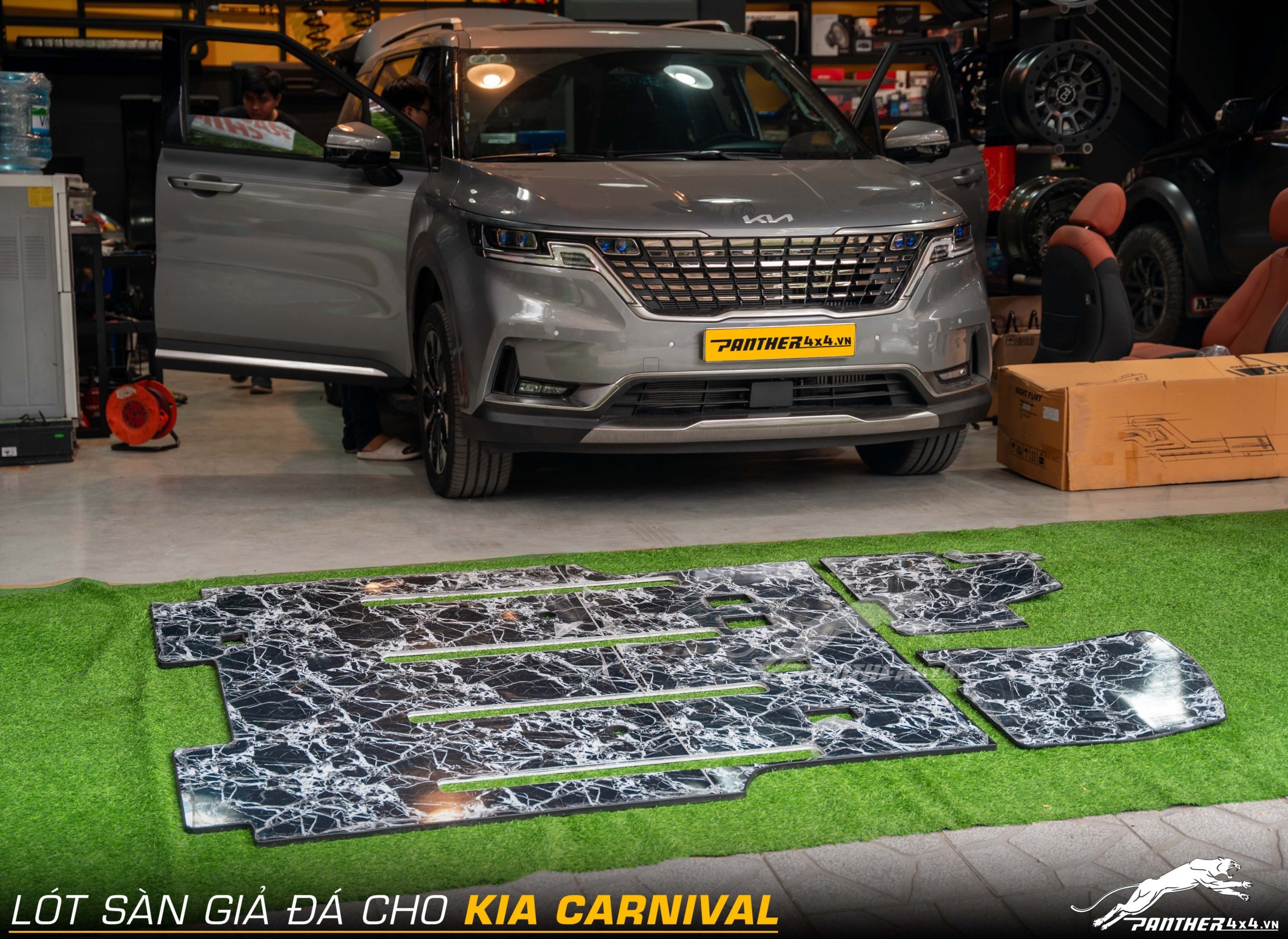 lót sàn nhựa vân đá cho Kia Carnival